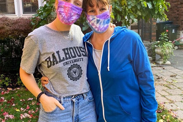 people wearing custom tie dyed mask