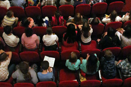 Students in theatre auditorium